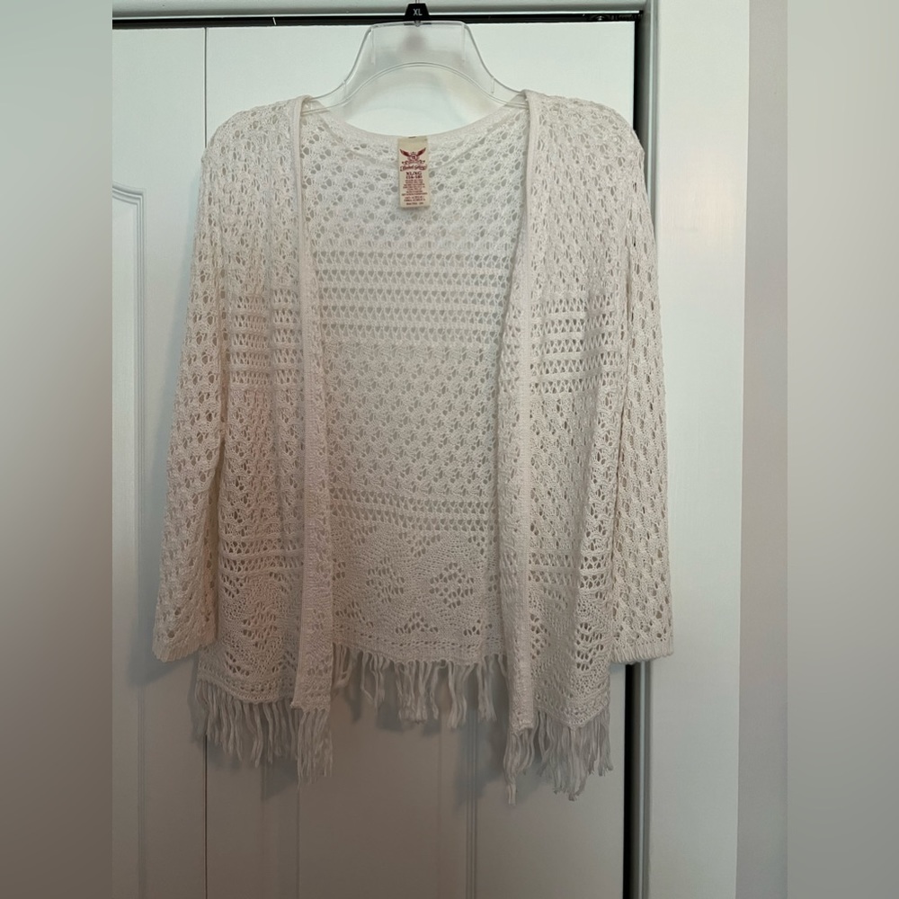 White sweater with fringe